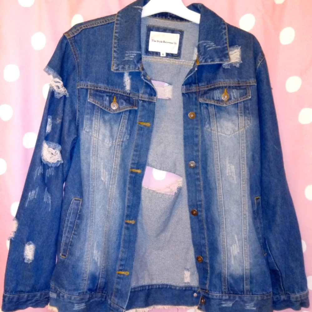 Distressed jean jacket